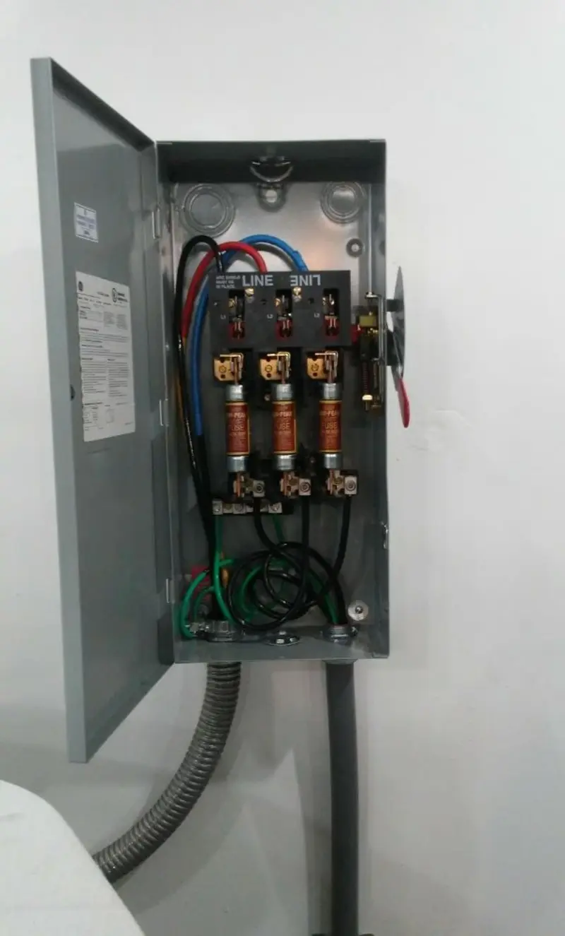 Three-phase disconnect switch installed for Smoke Detector Installation in Addison